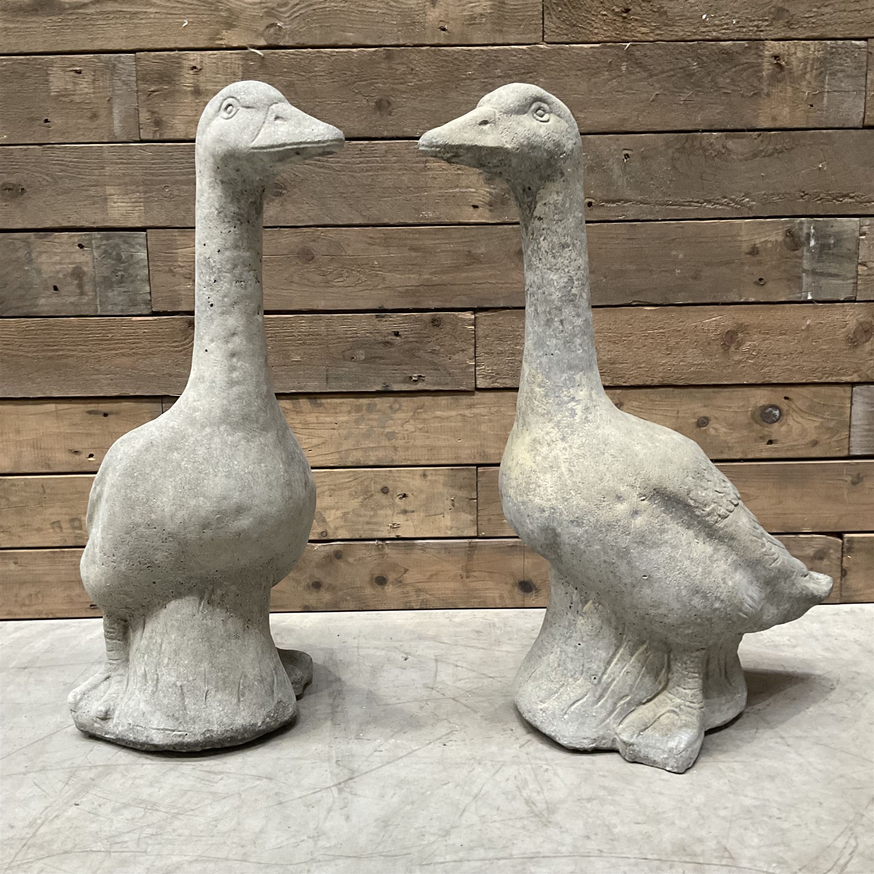 Pair of cast stone garden geese