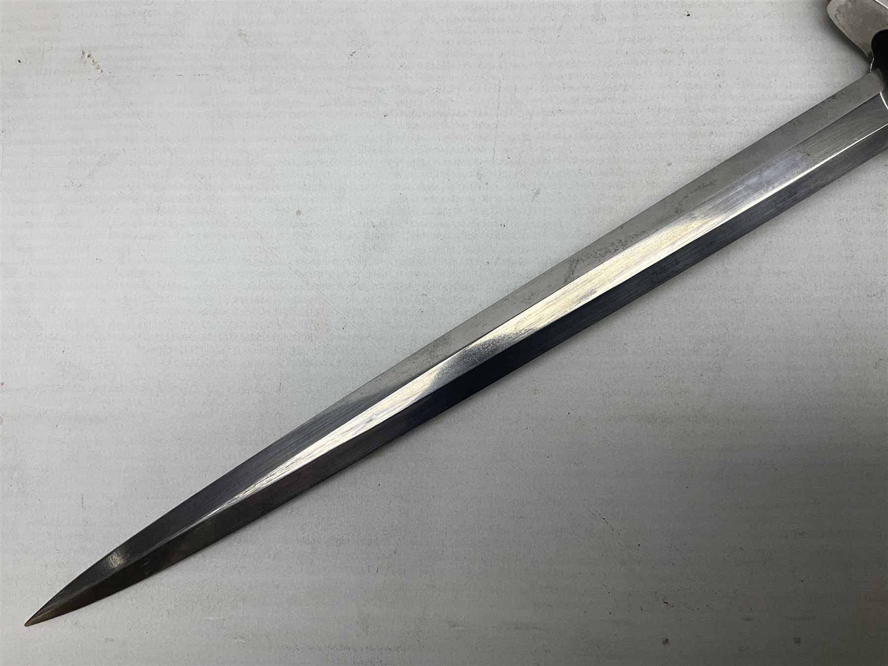 WW2 German Luftwaffe 2nd Pattern Officers dress dagger, with unmarked 25.5cm double edged steel blade, wire-bound pale orange/yellow celluloid grip, globular  pommel with oak leaves and traces of gilding, Luftwaffe eagle cross guard; in beaded scabbard with two suspension rings L43cm overall