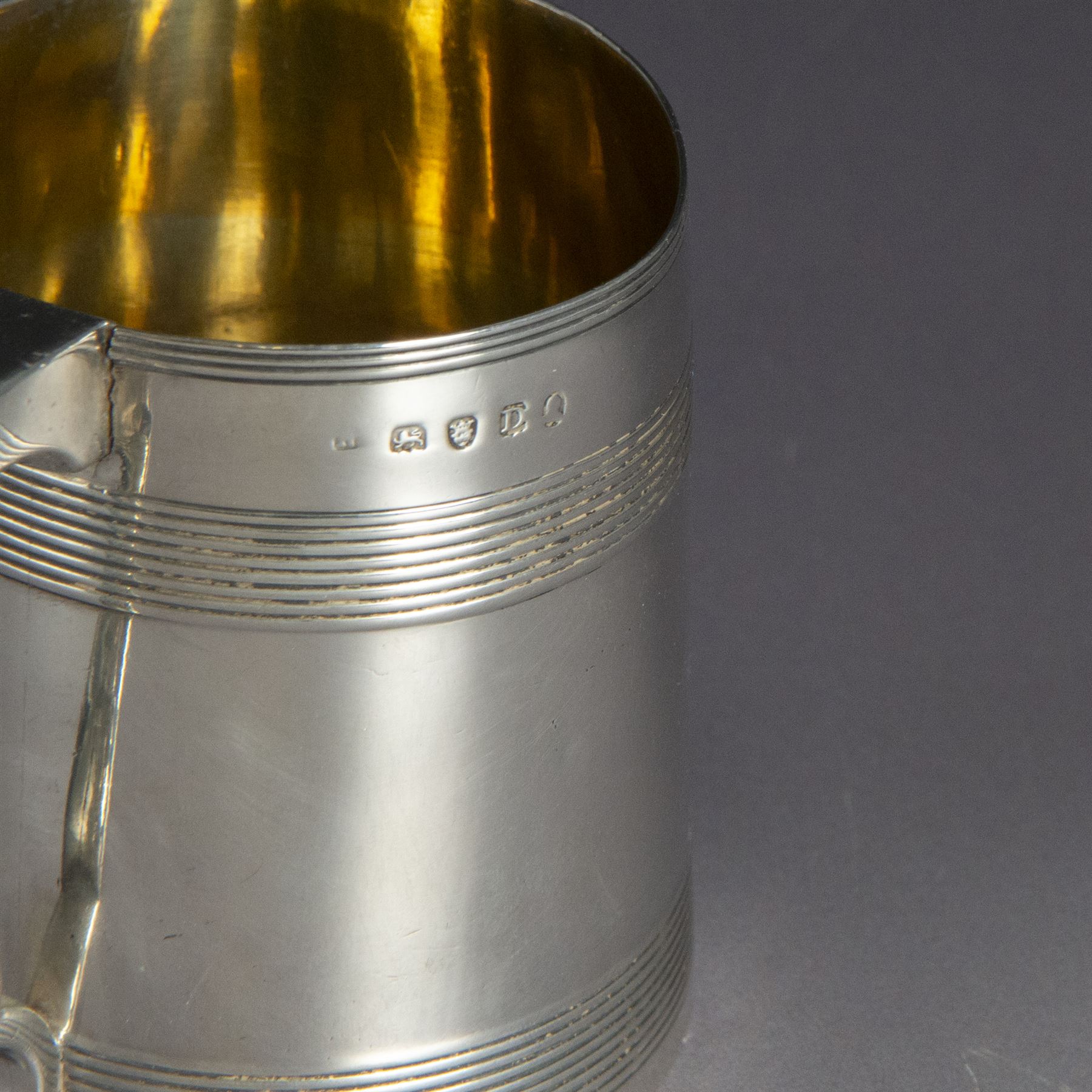 George III silver christening mug, of cylindrical tapering form, with banded decoration and scroll handle, the body with later presentation engraving, hallmarked London 1799, maker's mark worn and indistinct, H8cm