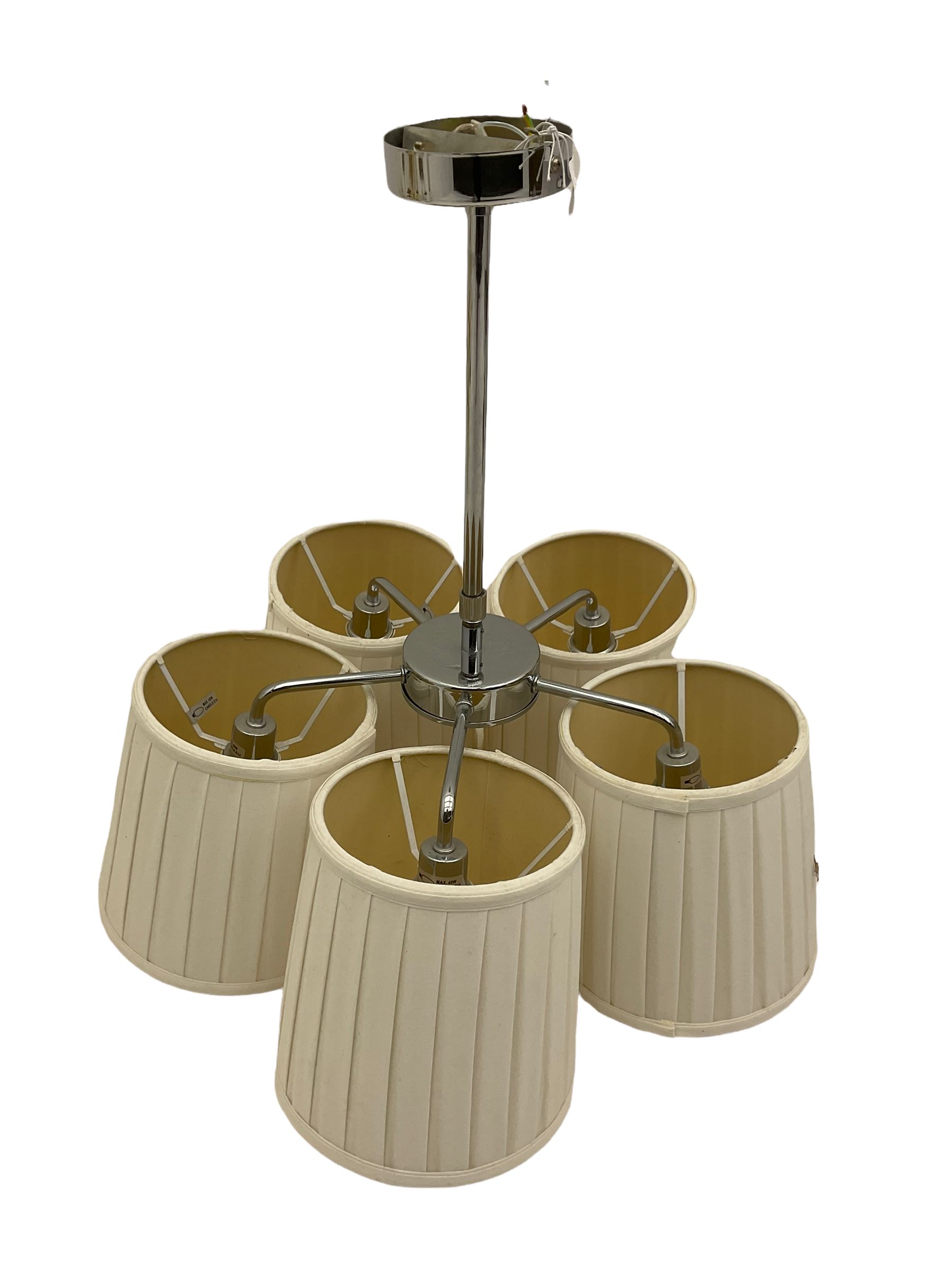 Brass twelve branch chandelier, heavy brass five branch chandelier and a modern light fitting (3)