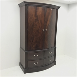 Georgian style mahogany bow front double wardrobe, two doors enclosing fitted interior above four drawers, W121cm, H195cm, D62cm