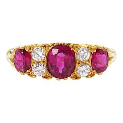 18ct gold three stone oval cut ruby and four stone round brilliant cut diamond ring, Birmingham 1972