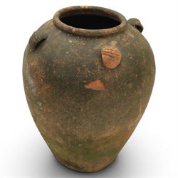 Large 20th century weathered terracotta urn, of ovoid form with four loop handles to shoulder, H61cm