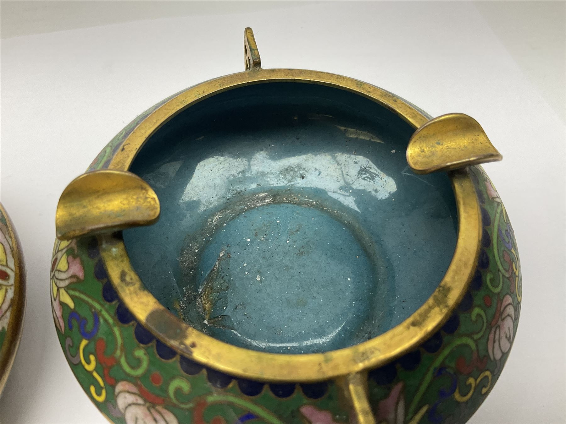 20th century Chinese cloisonne enamel smoking set, comprising two ashtrays, box and tray, with floral and foliate scrolling on green ground