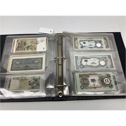 World banknotes, including Queen Elizabeth II The States of Jersey one pound 'DB202703', five pounds 'BB527762' and ten pounds 'AB651481', reserve bank of New Zealand two dollars '1L3 741894', King George V Straits Settlements one dollar 1st January 1935 'F/83 28924', various Bank of England notes etc, housed in two ring binder albums
