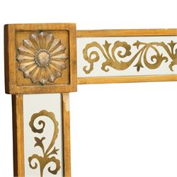 Regency inspired overmantel mirror, decorated with gilt foliate scrolls on the mirrored surrounds, flower and swag applied mounts