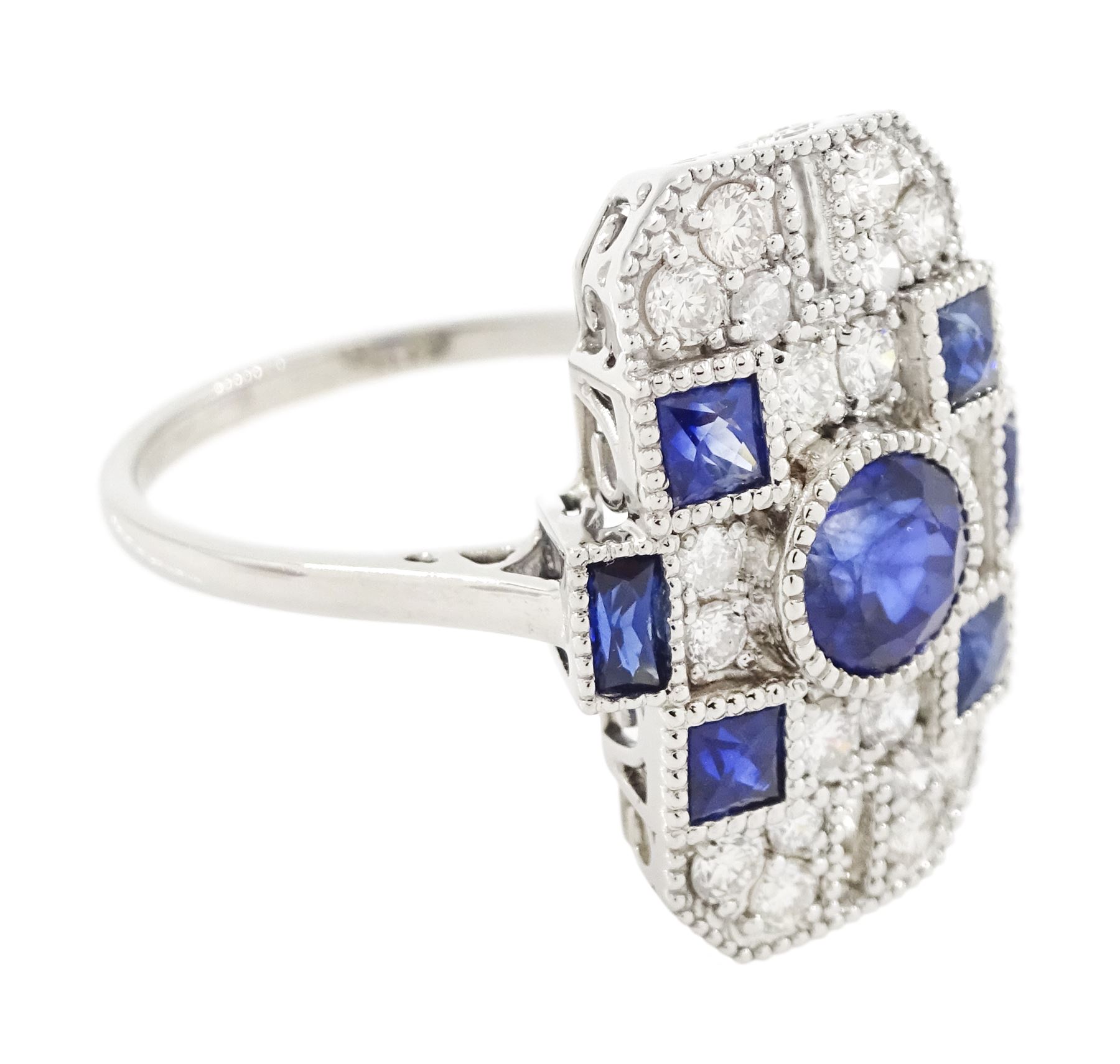 Platinum sapphire and diamond panel ring, milgrain set with round and calibre cut sapphires and round cut diamonds, stamped Pt 950, total sapphire weight 0.87 carat, total diamond weight 0.46 carat