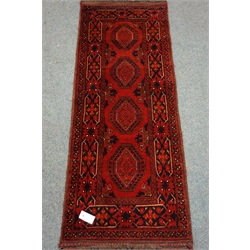  Two Persian style red ground rugs, 157cm x 84cm (maximum)  