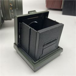 Zenza Bronica ETRS camera body, safari edition, serial no. 7100811, with 'Zenza Bronica Zenzanon EII 1:2.8 f=75mm' lens, serial no. 7908591, film magazine back, safari, serial no. 8100564, AE-ii metering head, safari, serial no. 617024, etc, all in leather case