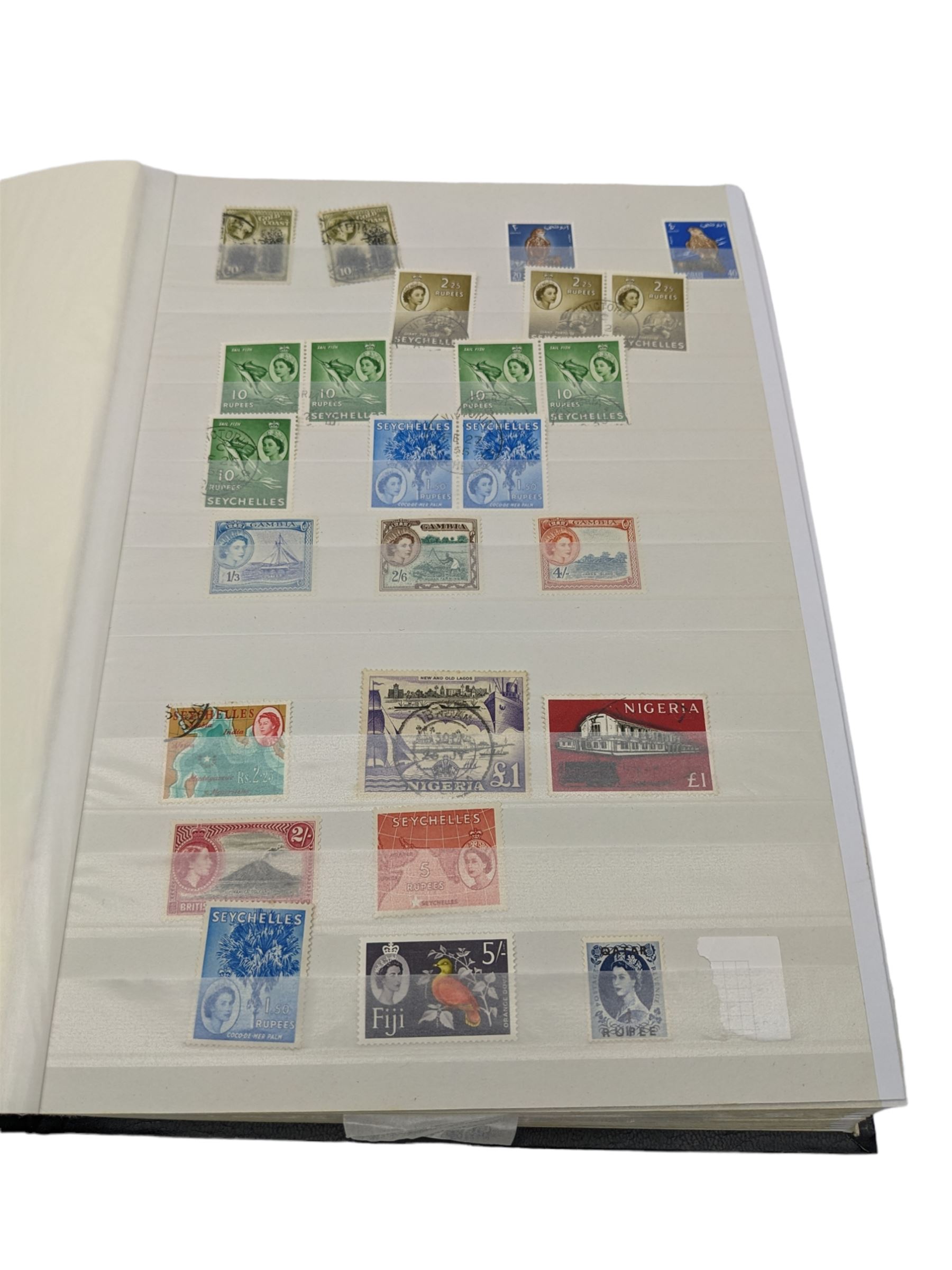 World Stamps including Seychelles, Southern Rhodesia, Sudan, Cyprus, Bermuda, Queen Victoria Canada, King Edward VII Straits Settlements etc, mixture of mint and used values, housed in a black stockbook