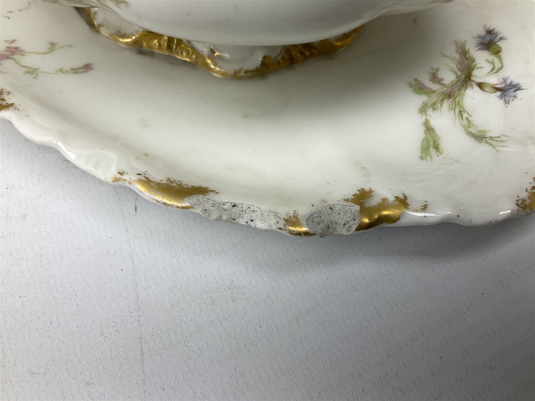 French Haviland Limoges part dinner service, decorated with floral sprays and gilding, to include two lidded tureens, thirteen plates, oval serving platter, etc, all stamped H & Co Made in France for James Green & Nephew (17) 