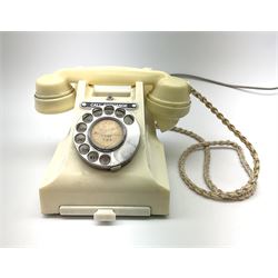 A Vintage cream Bakelite telephone, with lower drawer and plaque inscribed Call Exchange, H14cm.