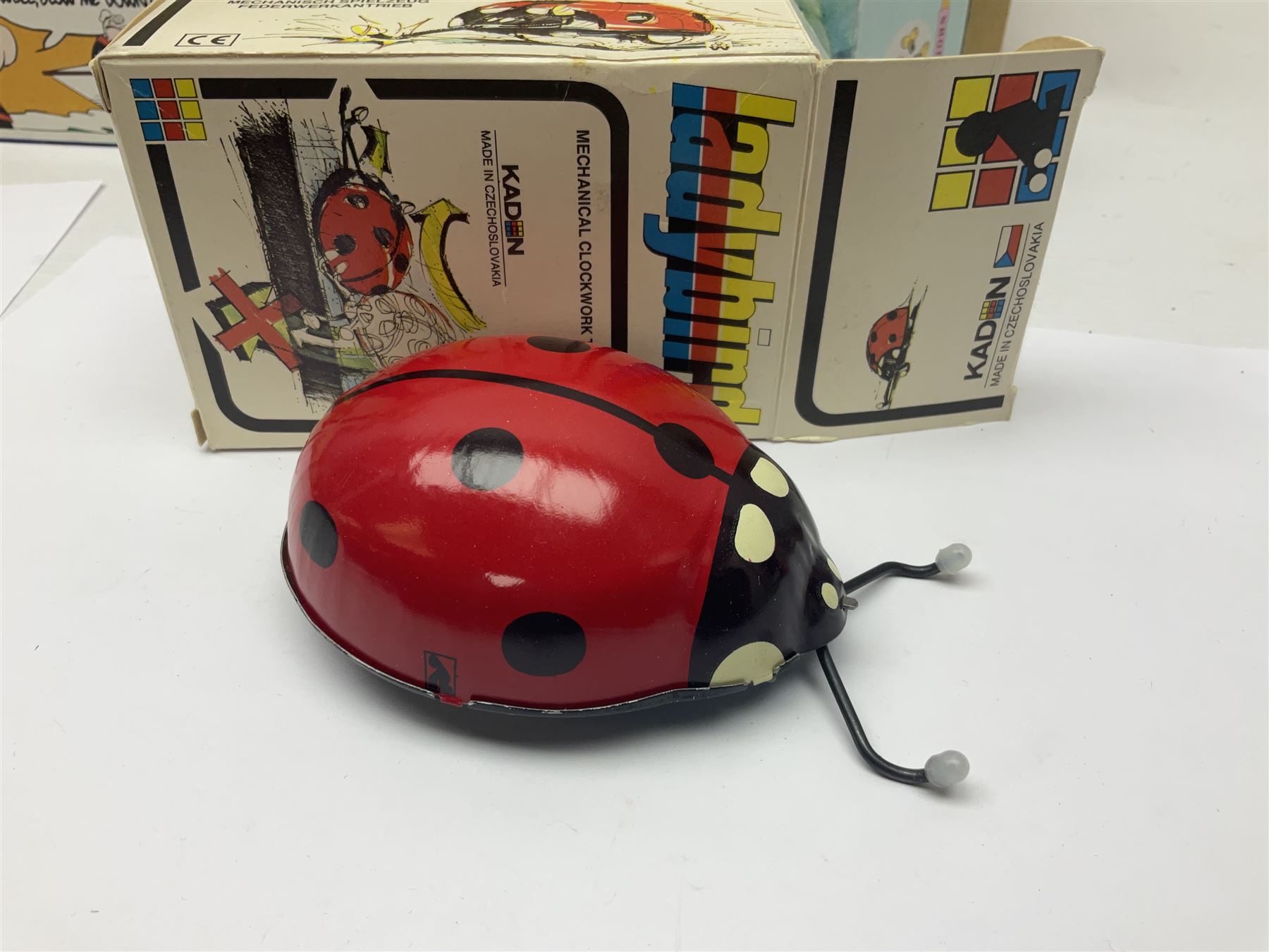 Twenty six tinplate models to include Ferris Wheel and Performing Circus Elephant, marked JW, further similar examples such as Duck on a Bike, Clown on Roller, Carousel; Popeye Tin Speedboat; Looney Tunes Wind Up Cars and Express Train; various international examples, MS107 Jumping Bambi, Pop Pop Boat, jumping frogs, pecking chickens etc; both boxed and loose