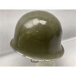 1950s French Algerian War steel helmet with liner; indistinctly marked 'S.I.A. LE EANS(?) 71R'