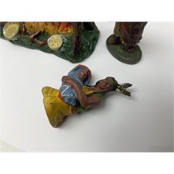 Five Elastolin American Indian figures, together with an Elastolin campfire and a cowboy tied to a tree, tallest H11cm