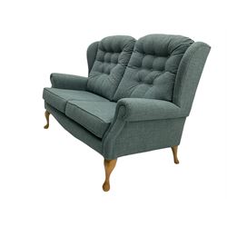 Sherborne England Lyndon two seat wing back sofa, upholstered in Highland Baltic fabric, light oak legs