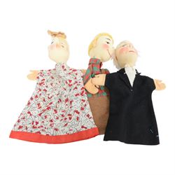 Collection of Kersa and similar German hand puppets, depicting various characters with felt faces with stitched and painted details