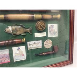 Four framed sporting memorabilia displays, the largest example containing 1930s cricket memorabilia, together with two fishing displays and a football display, each within wooden glazed frames, largest H105cm
