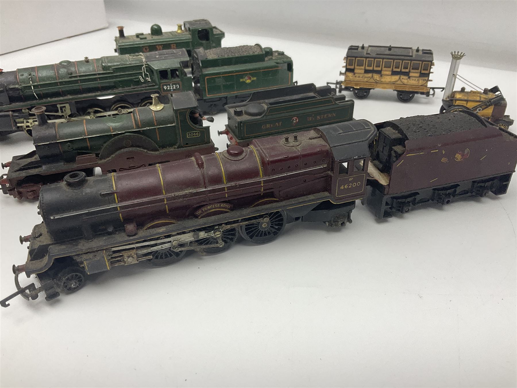 Hornby/Tri-ang '00' gauge - six locomotives - Class 9F 2-10-0 'Evening Star' No.92220; Class A3 4-6-2 (no name or number); Dean Single 4-2-2 'Lord of the Isles' No.3046; Princess Class 4-6-2 'The Princess Royal' No.46200; Class 57XX Pannier 0-6-0 tank No.8751; and Stephenson's Rocket with one passenger coach; all unboxed (6)