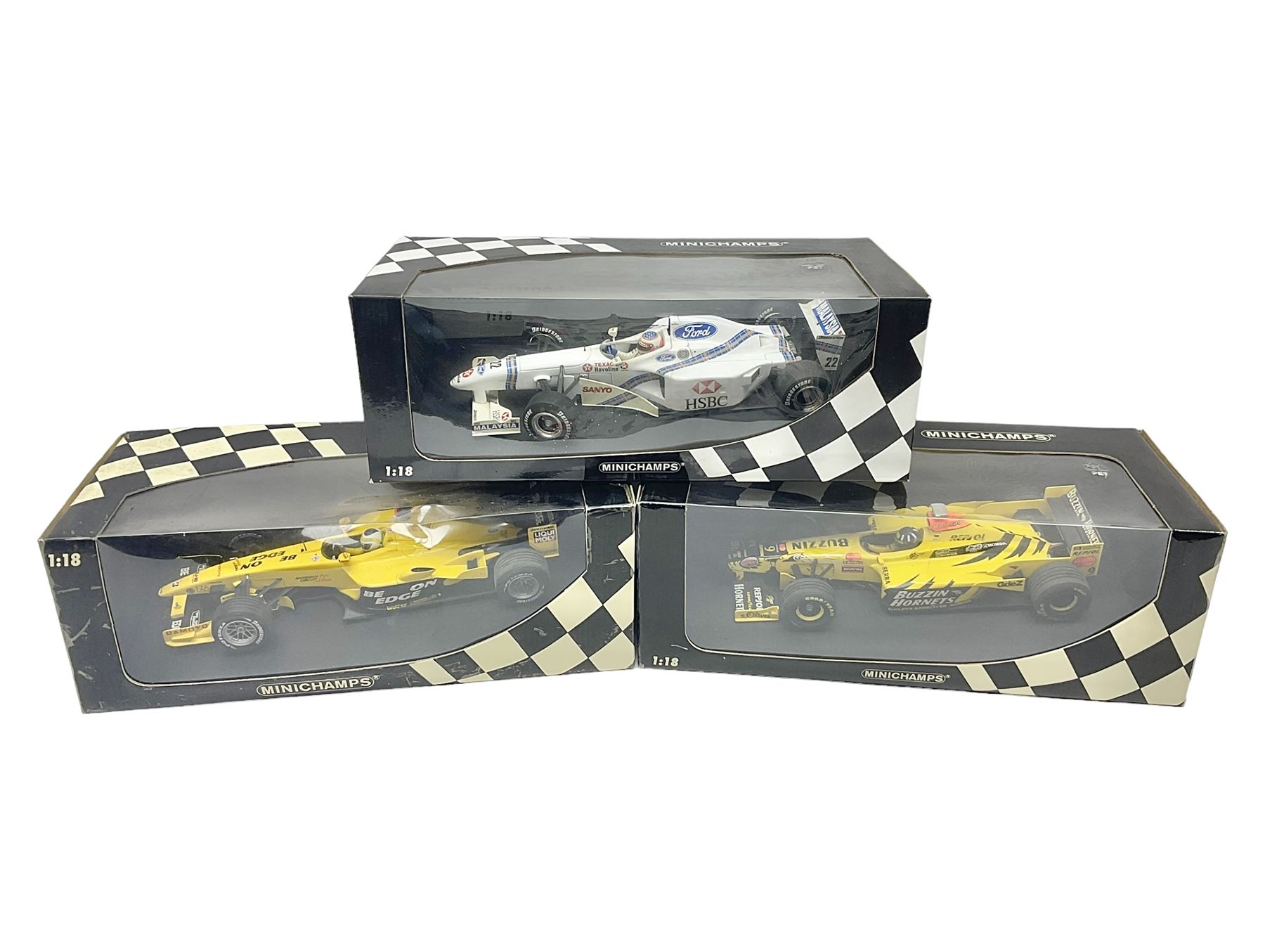 Three Minichamps 1:18 scale die-cast racing cars - Jordan Mugen Honda 198 D. Hill; Jordan Ford EJ13 G. Fisichella; and Stewart Ford SF 1 R. Barrichello; all boxed (3)