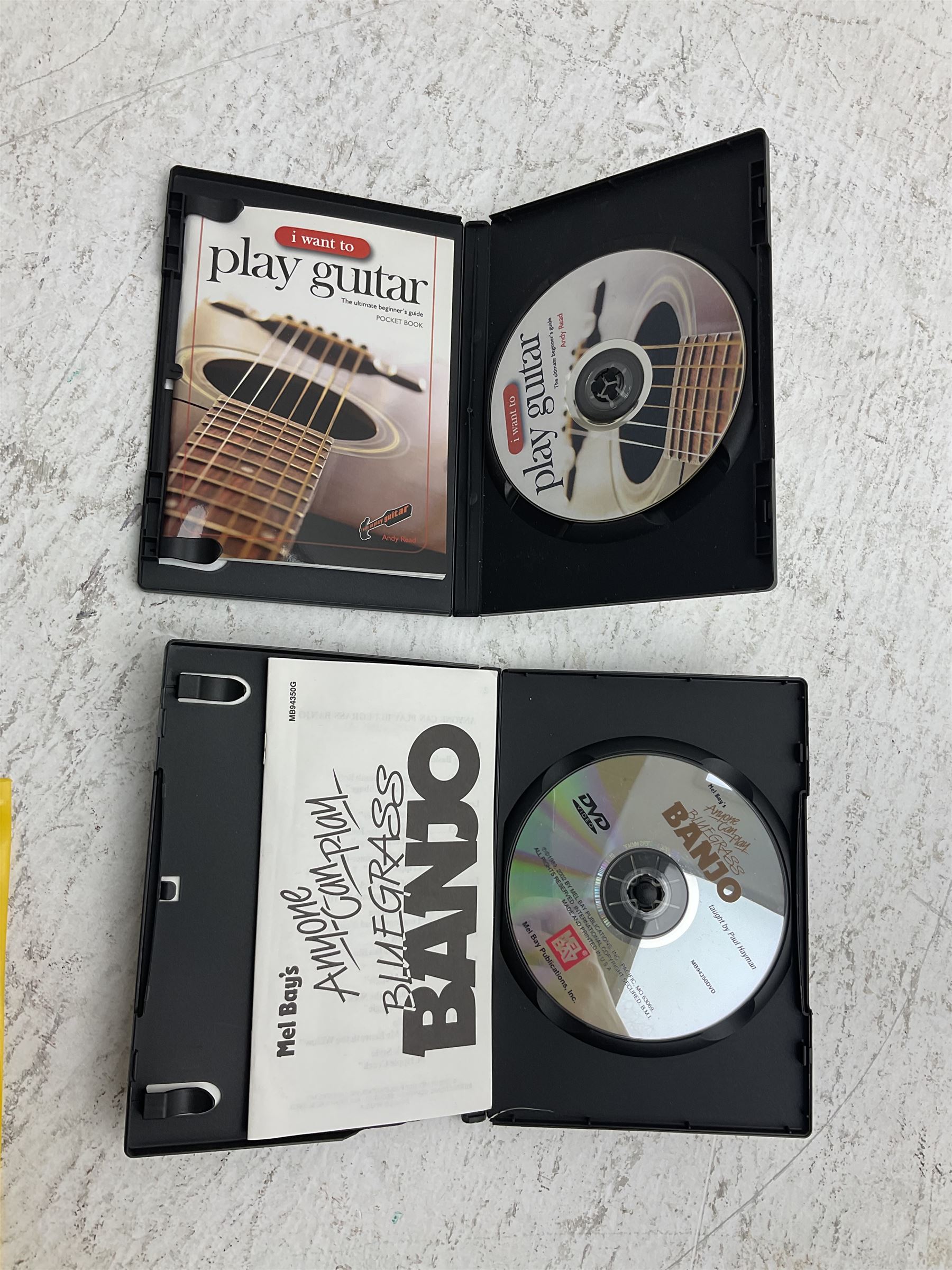 Rally five-string banjo with mahogany solid back L101cm in soft carrying case; and Brunswick Model BF200 acoustic guitar L103cm; with small quantity of instructional DVDs and booklets