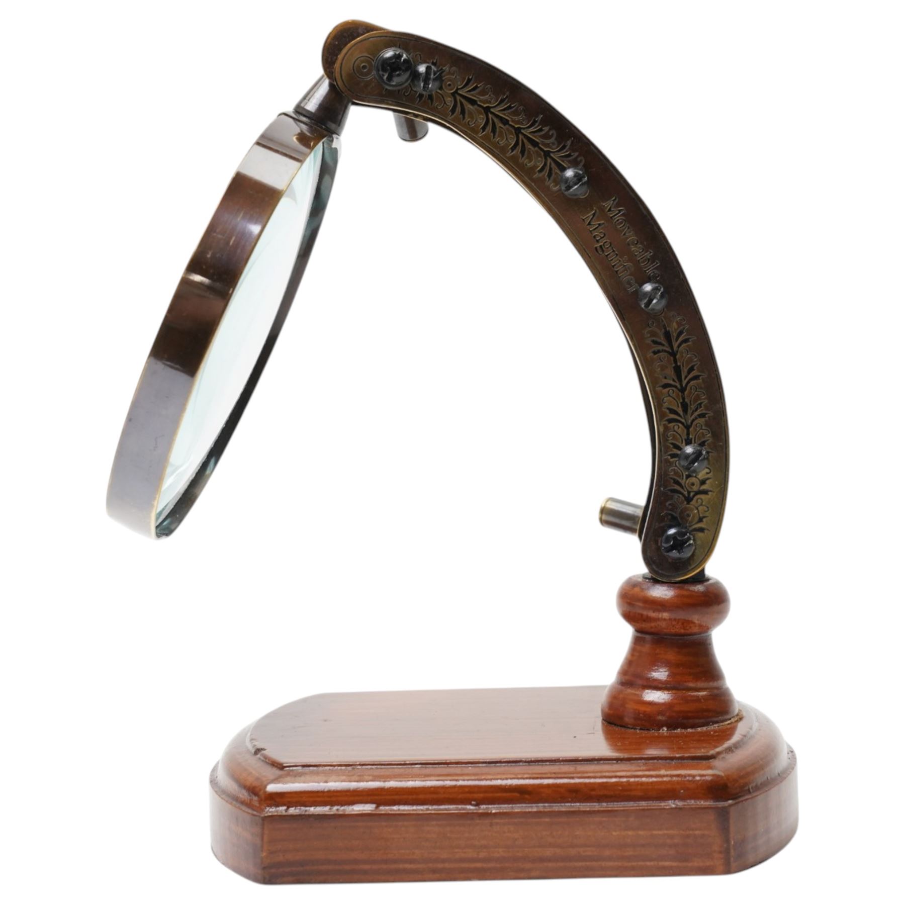 Magnifying glass on wooden stand