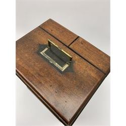 19th century mahogany travelling apothecary cabinet, with recessed brass carry handle to top, and two deep-section hinged doors to the front opening to reveal a fitted interior with clear glass bottles and two drawers, H27cm