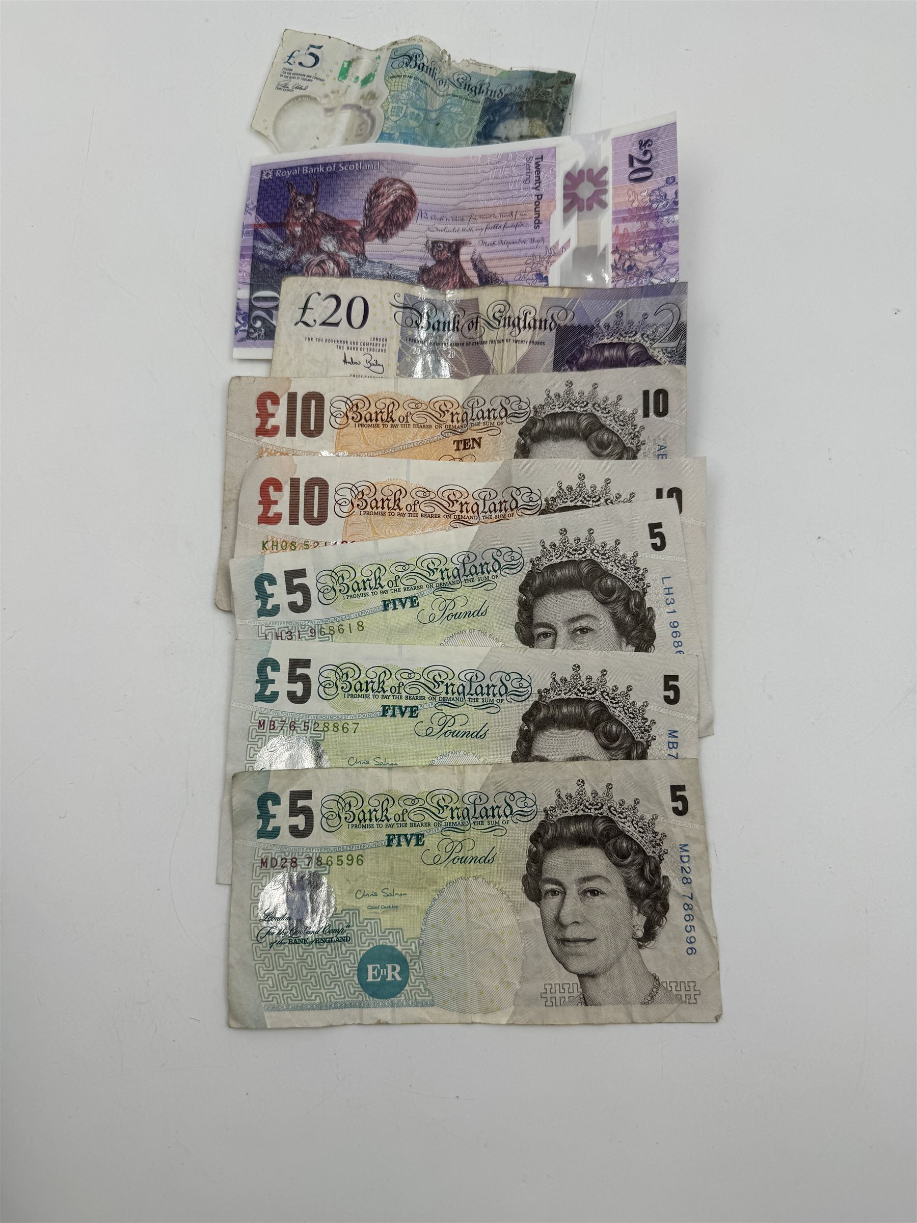 Various Great British banknotes including Bank of England Peppiatt and later one pound notes, three Salmon five pound notes, Salmon ten pound note, Lowther ten pound note, Bailey twenty pound note, Royal Bank of Scotland polymer twenty pound note etc. 