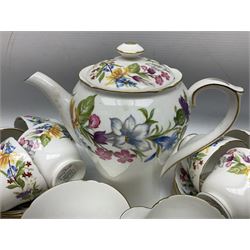 Shelley Spring Bouquet coffee wares, comprising coffee pot, eleven cups, twelve saucers, sucrier and milk jug, all with stamped green marks and pattern no 3651 beneath