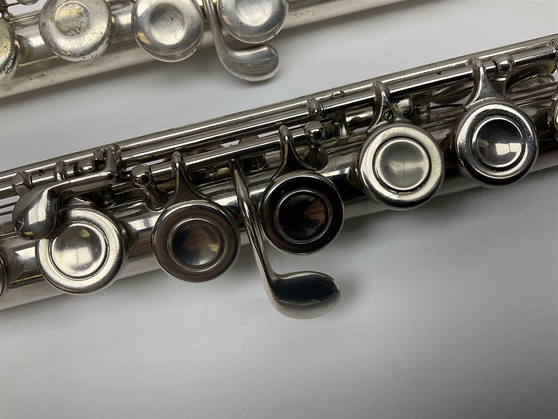 Boosey & Hawkes London Regent three-piece flute, serial no.345447; in B&H Bandhite hard carrying case; and Deg Music Company Inc. USA Claudel Model three-piece flute, serial no.491718, in hard carrying case (2)