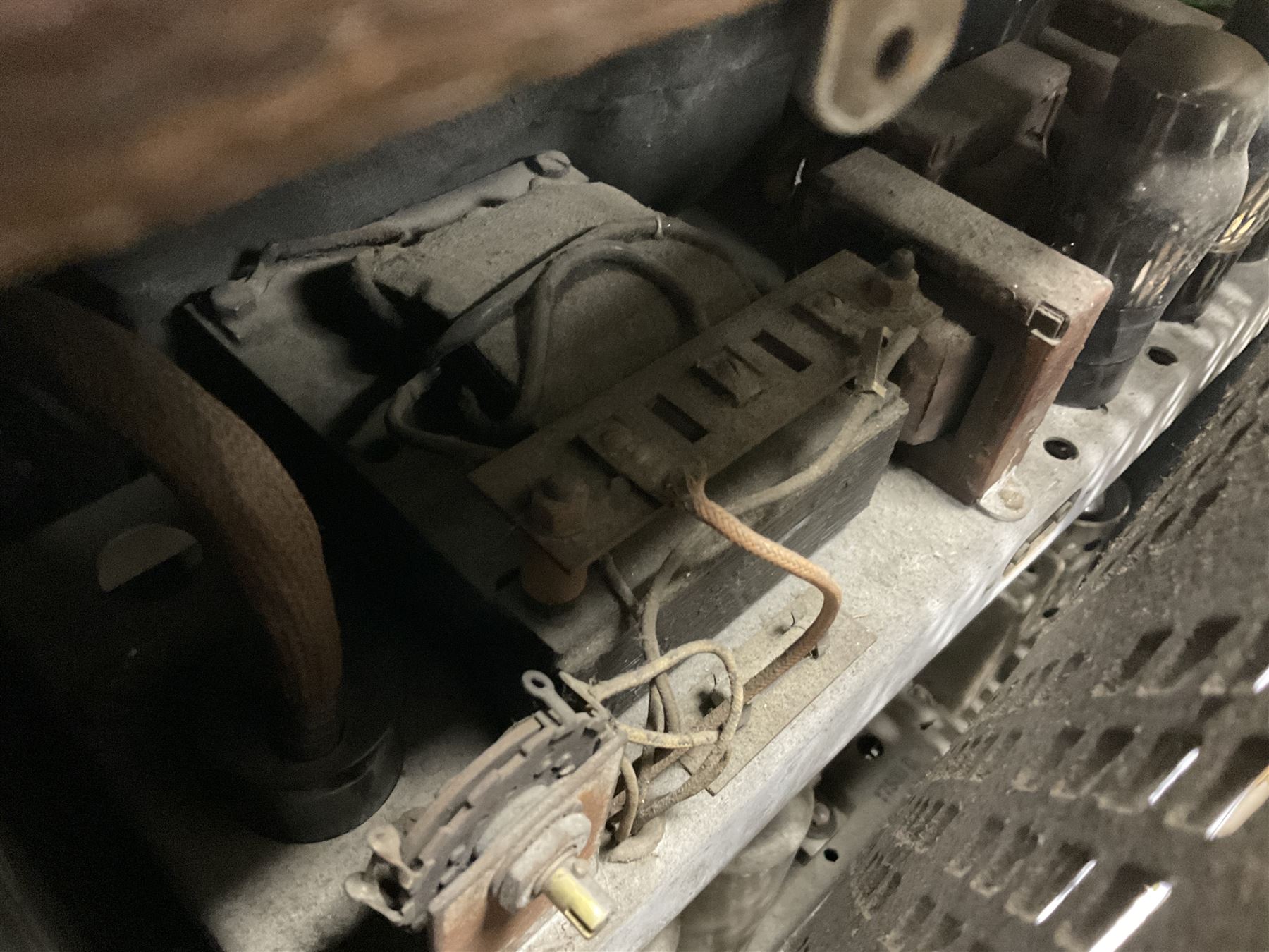 1930s Marconi Type 561 valve radio, in shaped Art Deco case with woven brass overlaid speaker, circa 1937, H58cm W50cm