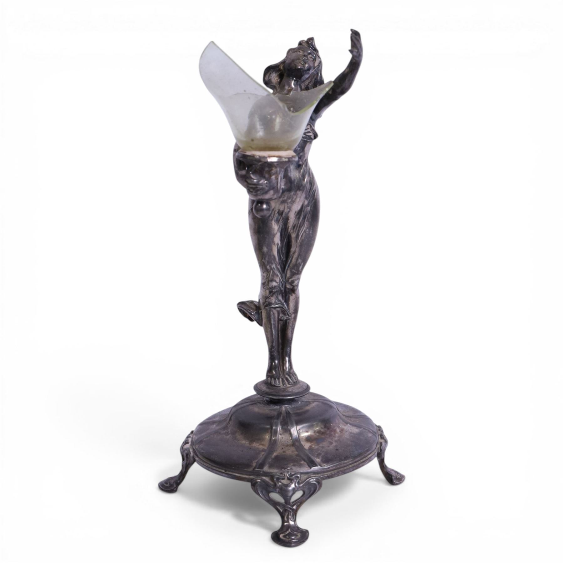 Art Nouveau pewter centre piece, modelled as a female figure upon a circular base raised  on four whiplash feet (a/f),  H28cm 