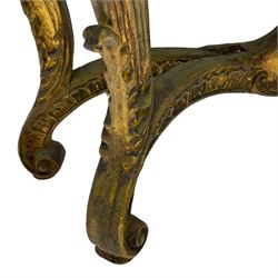 French Rococo design console or pier table, shaped and moulded pale marble top, the apron carved with pierced shell and scrolling acanthus leaves, extending flower head decoration, on four acanthus carved cabriole supports with scrolled terminals, united by shell moulded stretcher rails with central scrolled foliage cartouche 