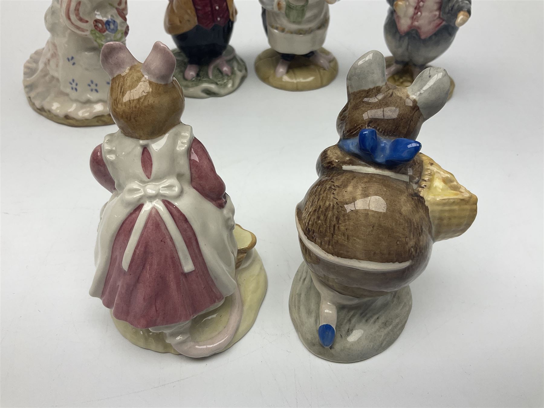 Five Royal Doulton Beatrix Potter figures, comprising Poppy Eyebright, Clover, Lord Woodmouse, Mr Apple and Dusty Dogwood, together with Beswick Appley Dapply figure and three Crummles Beatrix Potter enamel pill boxes