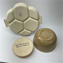 A Poole pottery hors d'oeuvres dish decorated with fish and shrimps in pastel colours D30.5cm, with a large studio pottery bowl with internal decoration D22cm and a studio pottery deep dish with orange and green decoration D7cm.