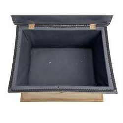 19th century upholstered ottoman, rectangular waisted form with hinged lid, upholstered in needle work cover decorated with floral panels and borders, the interior lined in blue fabric, lower moulded edge over compressed bun feet