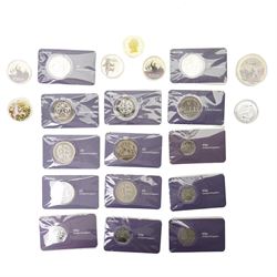 Nine Elizabeth II and Charles III £5 coins, five 50p coins, five Soloman Islands half doll...