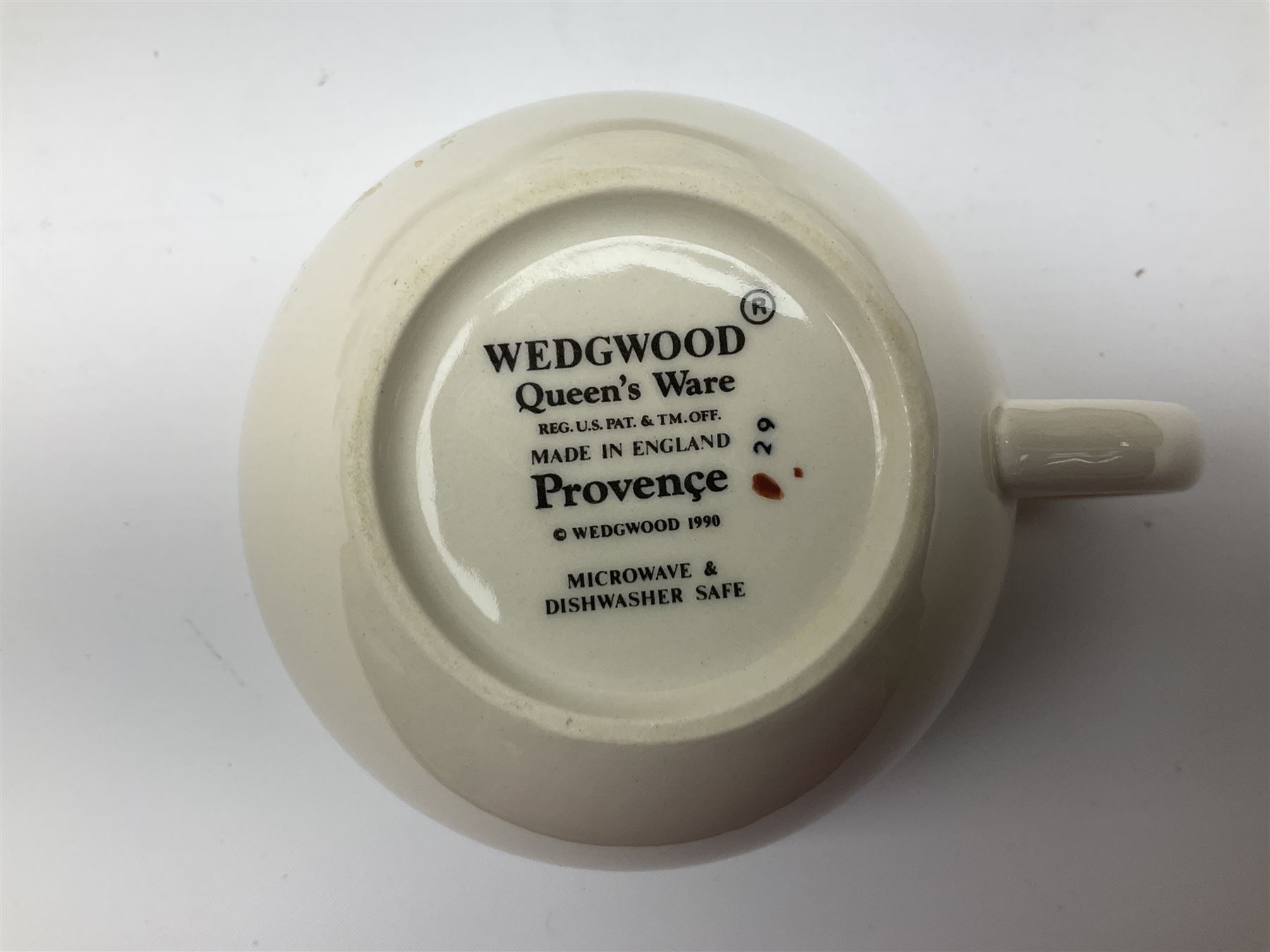 Wedgwood Queens Ware tea and dinner wares in Provence pattern, including ten cups and saucers, milk jug, butter dish with cover, ten dinner plates, ten bowls and ten side plates etc (71), together with Royal Doulton tea wares in Canton pattern, comprising six cups and saucers, milk jug, open sucrier and six dessert plates.    