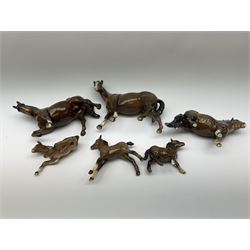 Group of Beswick horses, comprising brown example, first version model no 1549, Shetland Pony model no 1033, Shetland foal model no 1034, Mare facing left, and two Foals. (6). 