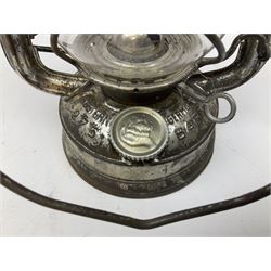 Copper and brass ship’s lamp marked ‘Anchor’, H25cm, Feuer hand storm lantern, Bialaddin Model 315 paraffin lamp and an Anchor lamp (4)