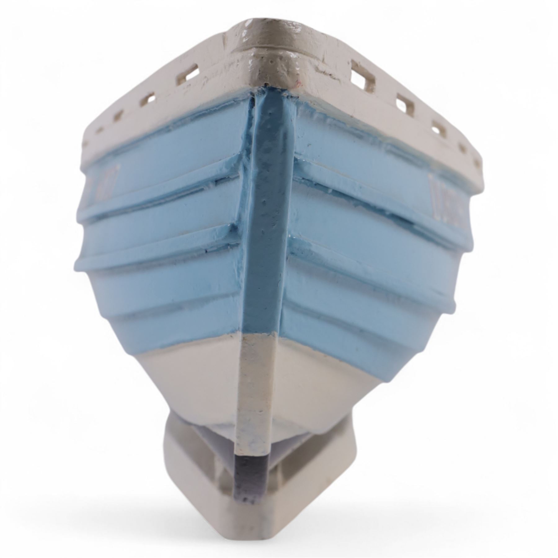 Wooden model of the Whitby fishing coble WY.17 G.Burdon 'Dorothy', painted in blue and white with red detail, with rudder and oars, on a painted wooden stand, L73cm, H20cm