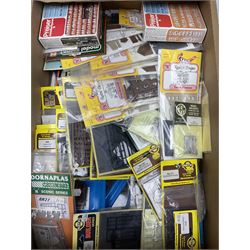 Large quantity of unused and unopened layout and trackside accessories by Knightwing, Graham Farish, Peco, Fleetline, Ratio, Kestrel etc including animal figures, post boxes, sheds, sacks, barrels, coach interiors, fencing, vehicles, tracksettar, water towers, signal boxes, telegraph poles, buildings etc