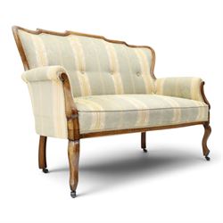 Edwardian mahogany three-piece salon suite, comprising settee and two armchairs, shaped frames with upholstered backs, scrolled arm supports and serpentine seat rails, upholstered in striped floral damask fabric, on cabriole supports with castors (Armchairs: H 96cm, W 70cm, D 68cm)