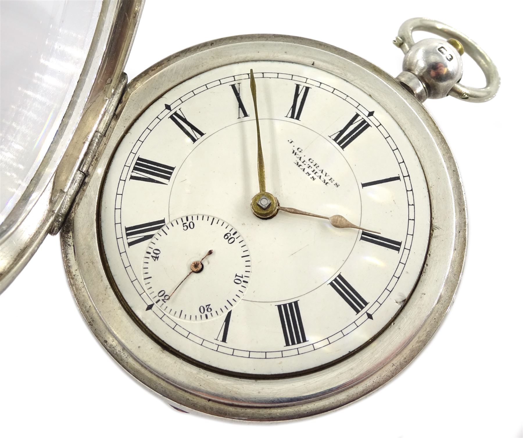 19th century silver open face key wound pocket watch by Waltham Mass, No. 845724, retailed by J.G. Graves, white enamel dial with Roman numerals and subsidiary seconds dial, engine turned case with engraved initials in cartouche, Birmingham 1899