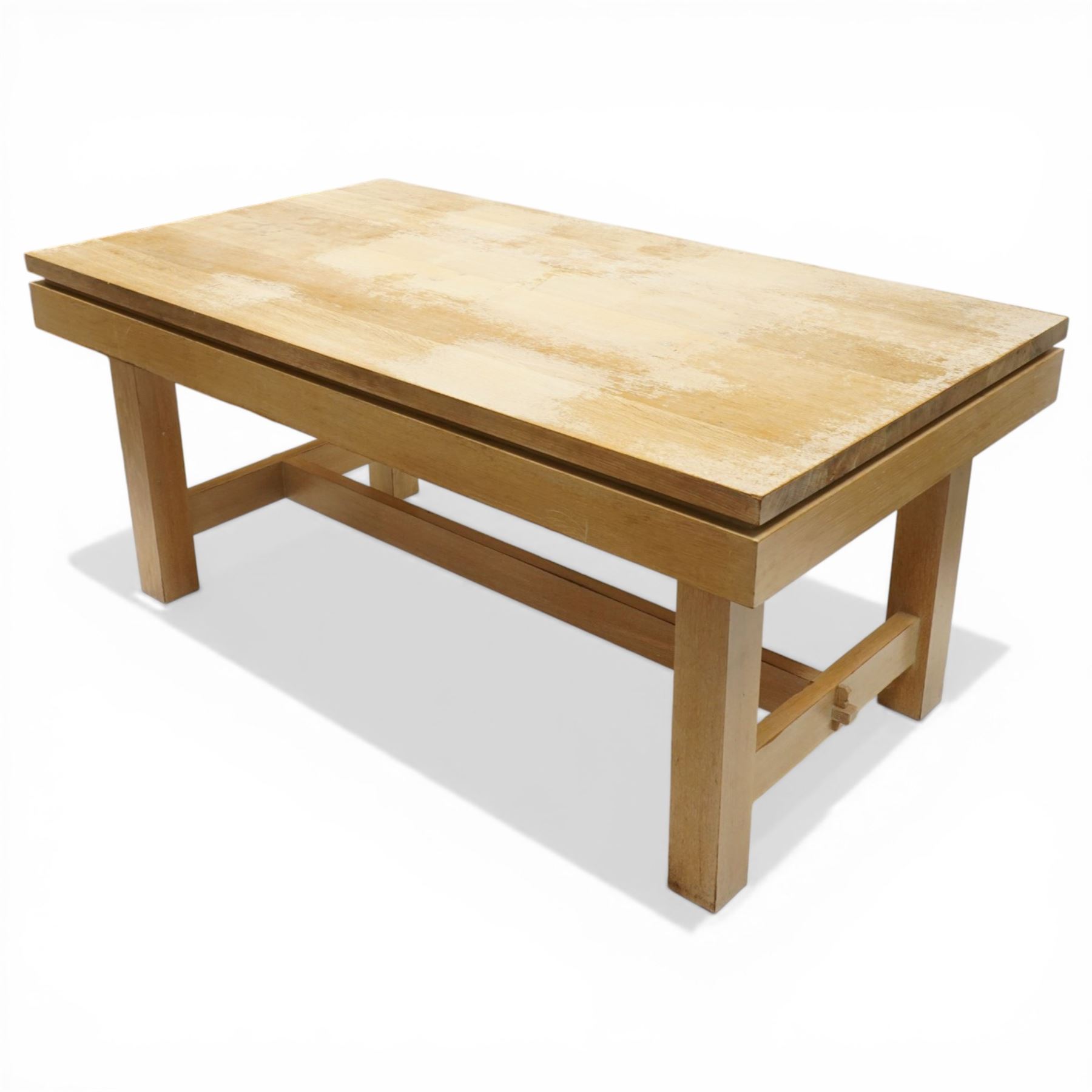 Late 20th century solid light oak refectory style dining table, rectangular top raised on square supports united by stretcher (W180cm D100cm H81cm); Set of six light oak high-back dining chairs with burgundy leather seats (W49cm H109cm)