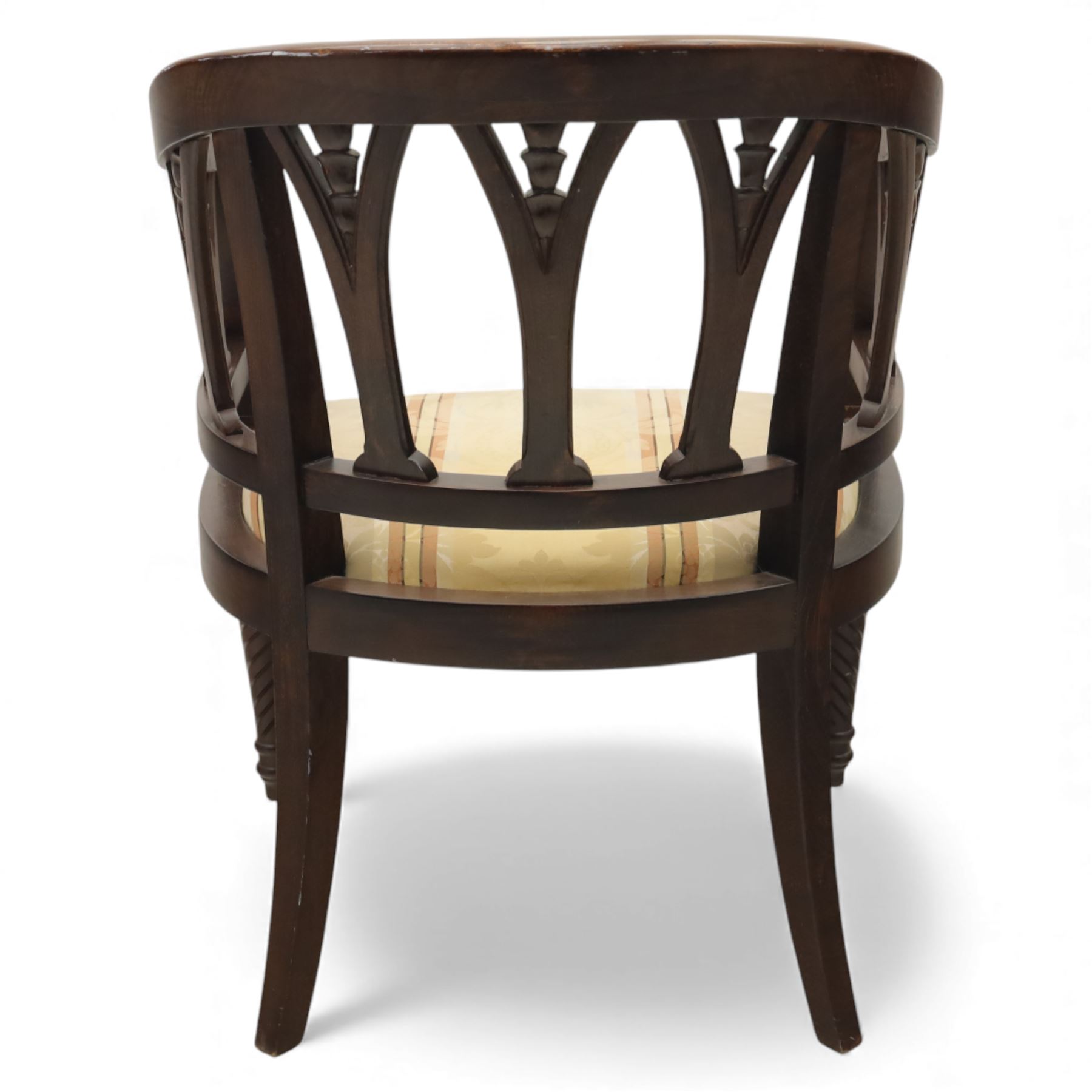 Late 20th century mahogany tub armchair, curved open back with pierced splat supports beneath a rounded top rail, upholstered drop-in seat in patterned fabric, raised on turned and ringed supports