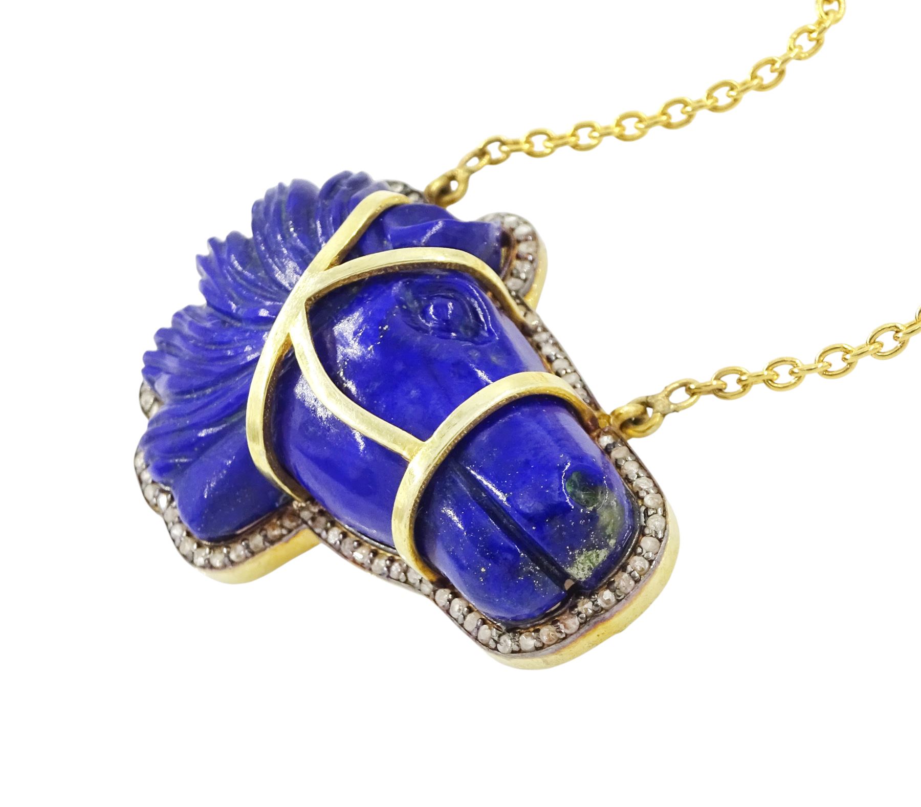 Silver-gilt lapiz lazuli and diamond horses head necklace, carved head with rose cut diamond surround, to a gilt fine link chain necklace, lapiz weight approx 46.20 carat, total diamond weight approx 0.50 carat