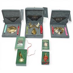 Set of three Georg Jensen annual mobile Christmas decorations, and two further Christmas o...