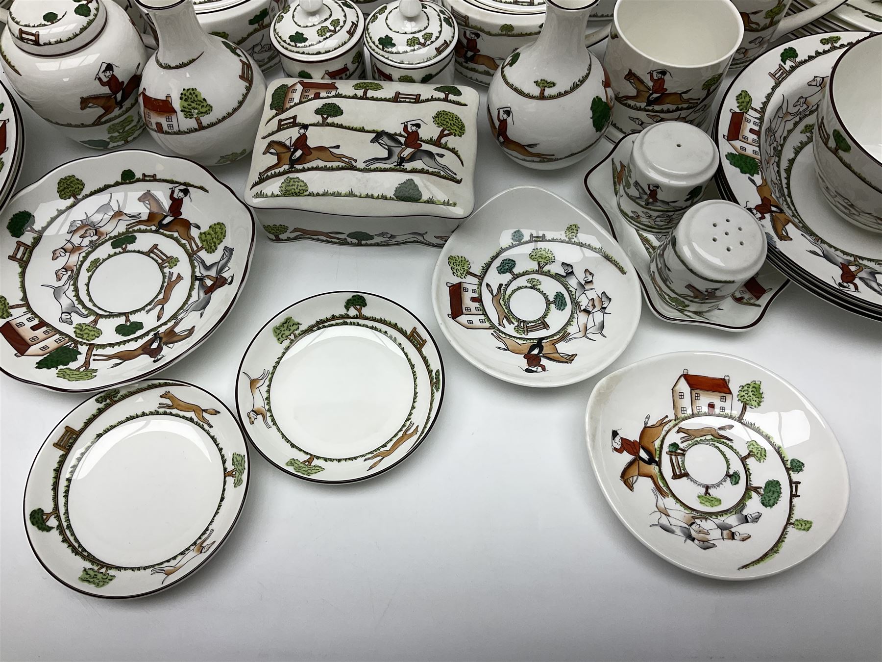 Wedgwood Hunting Scenes dinner and tea service for ten, to include dinner plates, side plates, dessert plates, cups and saucers, mugs, two large teapots, two milk jugs, etc, together with matching items by coalport and Staffordshire (94)