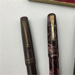 Six fountain pens, to include four De La Rue examples and two Mentmore, five with 14ct gold nibs